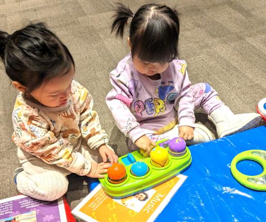 Meeting new friends and playing while sharing during our 1-2-3 Play with Me (Parent-Child Workshop.)