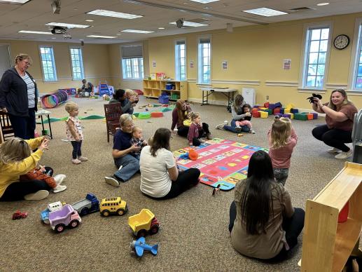 Circle time at the end of a "Play With Me" Parent-Child workshop.