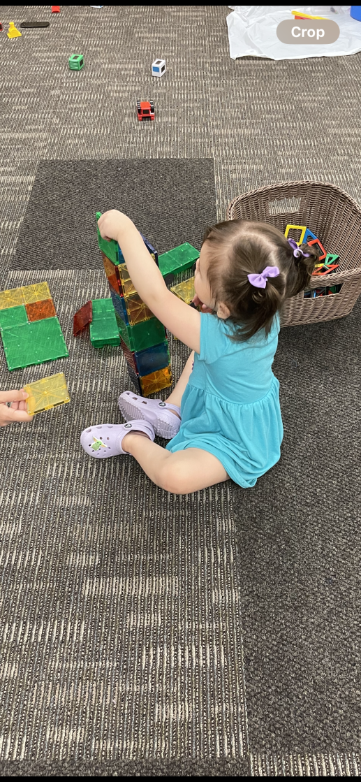 Child playing with Magna-Tiles