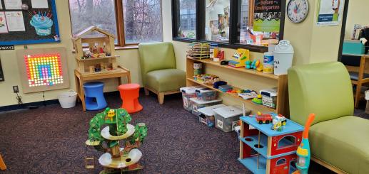 Children enjoy the Litezilla, chalkboard, dollhouse, building toys and more.