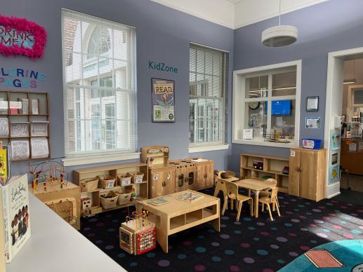 Van Wyck Library's Kidzone that features a play kitchen and a variety of toys.