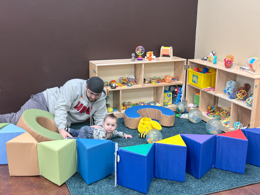 Father and child participating in workshop