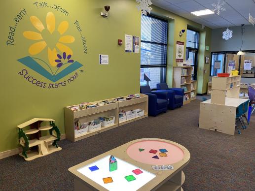 Family Place Center with toys, art and writing, light table with see-through toys, and parent collection