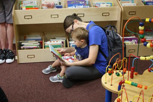 Mother reading to child