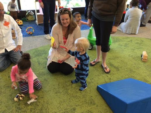 families playing in early childhood space