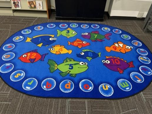 Rug in children's area where they can learn about letters and numbers